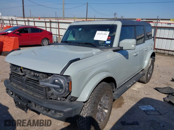 2023 Ford Bronco z VIN 1FMDE5BH5PLB37801, wystawiony jako IAAI lot #41691282 z przebiegiem 21 129 mil mil oraz . Historia ofert i sprzedaży dostępna na DreamBid. Obrazek 2.