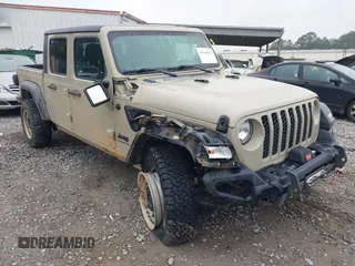 2020 Jeep Gladiator Sport S z VIN 1C6HJTAG2LL184767, wystawiony jako IAAI lot #41549812 z przebiegiem 79 728 mil mil oraz . Historia ofert i sprzedaży dostępna na DreamBid. Obrazek 1.