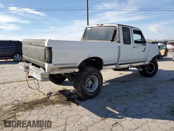 1994 Ford F-150 with VIN 1FTEX14N0RKA38553, listed as a Copart auction lot 46876235 with 330,998 mi miles and Salvage Title. Bid and sale history available at carsss.com. Image 3.