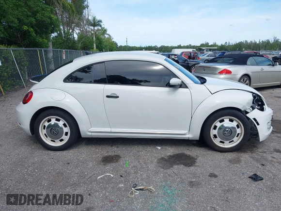 2015 Volkswagen Beetle Fleet Edition with VIN 3VWF17AT2FM656714, listed as a IAAI auction lot 42698040 with 72,348 mi miles and . Bid and sale history available at DreamBid. Image 14.