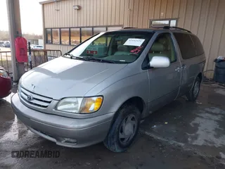 2002 Toyota Sienna LE with VIN 4T3ZF13C72U422993, listed as a IAAI auction lot 41552421 with 260,014 mi miles. Bid and sale history available at carsss.com. Image 2.