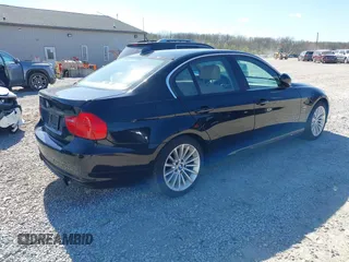 2011 BMW 3 Series 335i xDrive with VIN WBAPL5G50BNN23199, listed as a IAAI auction lot 42041719 with 205,807 mi miles. Bid and sale history available at carsss.com. Image 4.