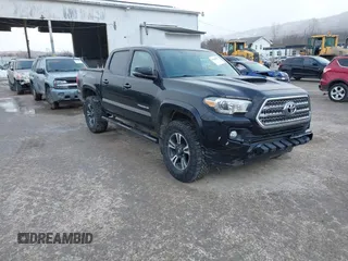 2016 Toyota Tacoma SR with VIN 3TMCZ5AN2GM027945, listed as a IAAI auction lot 41446277 with 51,781 mi miles and . Bid and sale history available at DreamBid. Image 1.