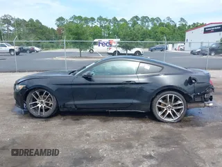 2015 Ford Mustang EcoBoost with VIN 1FA6P8TH5F5374241, listed as a IAAI auction lot 42556786 with 140,017 mi miles and . Bid and sale history available at DreamBid. Image 14.
