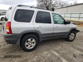 2002 Mazda Tribute LX with VIN 4F2CU08122KM01491, listed as a Copart auction lot 45290265 with 134,141 mi miles and Salvage Title. Bid and sale history available at carsss.com. Image 3.