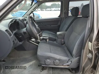 2004 Nissan Frontier XE with VIN 1N6ED29X64C478172, listed as a Copart auction lot 49031985 with 210,354 mi miles and Salvage title. Bid and sale history available at DreamBid. Image 7.
