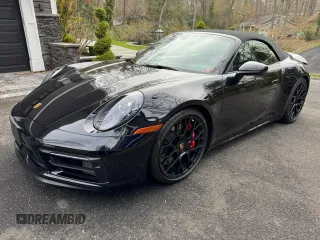 2022 Porsche 911 Carrera S z VIN WP0CB2A90NS244999, wystawiony jako Copart lot #56801295 z przebiegiem 1735 mil mil oraz Nie do naprawy. Historia ofert i sprzedaży dostępna na DreamBid. Obrazek 2.