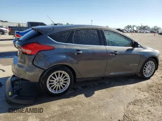 2016 Ford Focus Electric z VIN 1FADP3R48GL407096, wystawiony jako Copart lot #80754803 z przebiegiem 48 663 mil mil oraz . Historia ofert i sprzedaży dostępna na DreamBid. Obrazek 3.
