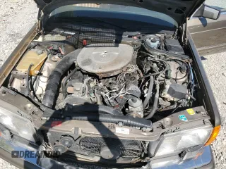 1987 Mercedes-Benz 420 with VIN WDBCA35D0HA311262, listed as a Copart auction lot 71760554 with 185,520 mi miles and Salvage Title. Bid and sale history available at carsss.com. Image 11.