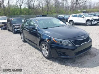 2014 Kia Optima LX with VIN 5XXGM4A72EG343520, listed as a IAAI auction lot 42050562 with 126,270 mi miles. Bid and sale history available at carsss.com. Image 1.
