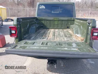 2023 Jeep Gladiator Rubicon with VIN 1C6JJTBGXPL586154, listed as a IAAI auction lot 41370352 with 11,207 mi miles and . Bid and sale history available at DreamBid. Image 8.