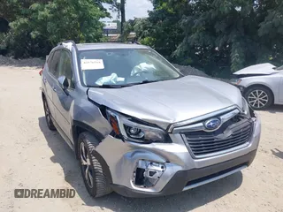 2019 Subaru Forester Touring with VIN JF2SKAWC9KH578307, listed as a IAAI auction lot 42576518 with 70,182 mi miles and . Bid and sale history available at DreamBid. Image 1.