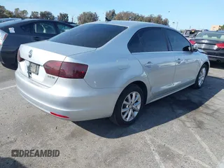 2013 Volkswagen Jetta Sedan SE with VIN 3VWDP7AJ5DM440793, listed as a IAAI auction lot 41936412 with 117,383 mi miles. Bid and sale history available at carsss.com. Image 4.