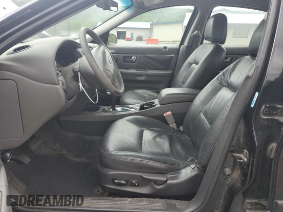2001 Ford Taurus SEL with VIN 1FAFP56S01A258399, listed as a Copart auction lot 58963115 with 162,989 mi miles and Salvage title. Bid and sale history available at DreamBid. Image 7.