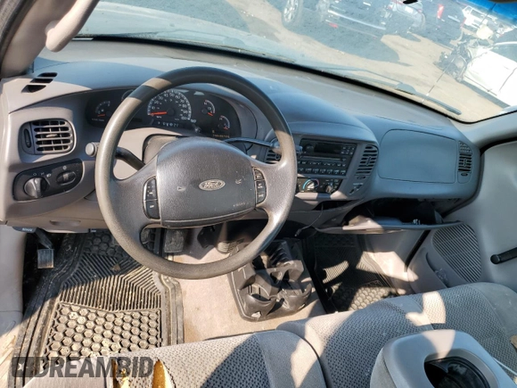 2002 Ford F-150 XL с VIN 1FTRF07202KA56864, выставлен на аукционе Copart как лот 71640724 с пробегом 165 654 миль миль и Списание • Salvage title. История ставок и продаж доступна на DreamBid. Изображение 8.