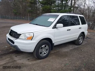 2004 Honda Pilot EX with VIN 2HKYF185X4H571558, listed as a IAAI auction lot 41901839 with 196,703 mi miles. Bid and sale history available at carsss.com. Image 2.