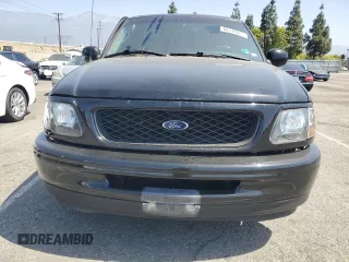 1998 Ford F-150 with VIN 1FTYF1764WNC18357, listed as a Copart auction lot 62138625 with 144,879 mi miles and Salvage title. Bid and sale history available at DreamBid. Image 5.