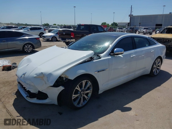 2012 Jaguar XJ XJL with VIN SAJWA2GB3CLV38500, listed as a IAAI auction lot 41990409 with 73,793 mi miles and . Bid and sale history available at DreamBid. Image 17.
