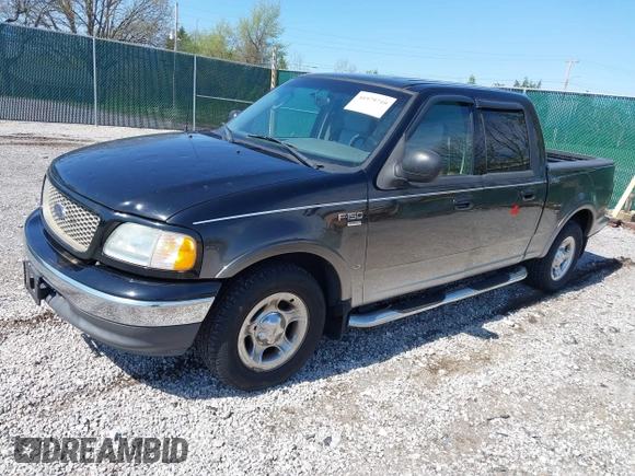 2003 Ford F-150 XLT with VIN 1FTRW07653KC18900, listed as a IAAI auction lot 41979710 with 99,525 mi miles. Bid and sale history available at carsss.com. Image 2.
