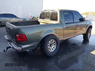 2002 Ford F-150 XLT with VIN 1FTRW08L42KE05595, listed as a IAAI auction lot 41486251 with 1 mi miles. Bid and sale history available at carsss.com. Image 4.