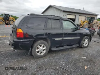 2004 GMC Envoy SLT with VIN 1GKDT13S842210243, listed as a Copart auction lot 55672595 with 148,232 mi miles and Clean Title. Bid and sale history available at DreamBid. Image 3.