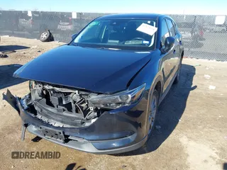 2019 Mazda CX-5 Grand Touring with VIN JM3KFBDM2K1685168, listed as a IAAI auction lot 41323598 with 88,429 mi miles. Bid and sale history available at carsss.com. Image 17.