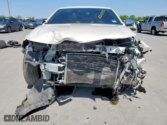 2014 Chevrolet Impala LTZ with VIN 1G1155S32EU149061, listed as a Copart auction lot 52488535 with 106,815 mi miles and Salvage title. Bid and sale history available at DreamBid. Image 5.