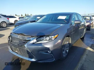2016 Lexus ES 300h z VIN JTHBW1GG6G2108510, wystawiony jako IAAI lot #41959175 z przebiegiem 142 882 mil mil oraz . Historia ofert i sprzedaży dostępna na DreamBid. Obrazek 2.