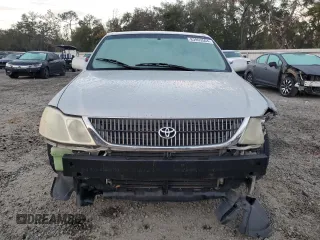 2002 Toyota Avalon XL with VIN 4T1BF28B32U263941, listed as a Copart auction lot 83993504 with 118,438 mi miles and Salvage Title. Bid and sale history available at DreamBid. Image 5.