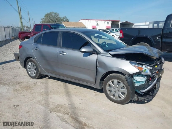 2023 Kia Rio S with VIN 3KPA24AD6PE611403, listed as a IAAI auction lot 41694267 with 26,251 mi miles. Bid and sale history available at carsss.com. Image 1.