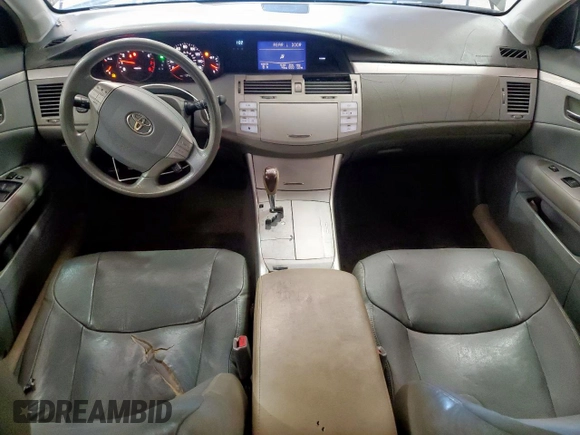 2006 Toyota Avalon XL z VIN 4T1BK36B86U134605, wystawiony jako Copart lot #57638445 z przebiegiem 134 094 mil mil oraz Czysty tytuł • Clean title. Historia ofert i sprzedaży dostępna na DreamBid. Obrazek 8.