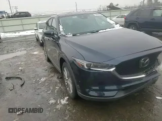 2021 Mazda CX-5 Grand Touring with VIN JM3KFBDM0M0391325, listed as a Copart auction lot 44863215 with 21,997 mi miles and Salvage Title. Bid and sale history available at DreamBid. Image 11.