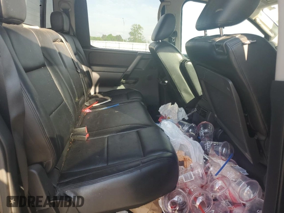 2010 Nissan Titan LE with VIN 1N6BA0EC6AN320790, listed as a Copart auction lot 52613495 with 224,118 mi miles and Salvage Title. Bid and sale history available at carsss.com. Image 10.