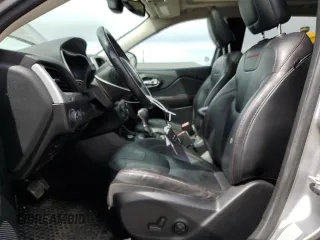 2014 Jeep Cherokee Trailhawk with VIN 1C4PJMBS6EW159174, listed as a Copart auction lot 56097795 with 130,299 mi miles and Salvage title. Bid and sale history available at DreamBid. Image 7.