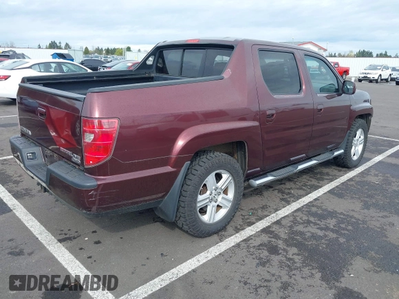 2009 Honda Ridgeline RTL with VIN 5FPYK16539B101836, listed as a IAAI auction lot 41894409 with 185,325 mi miles. Bid and sale history available at carsss.com. Image 4.