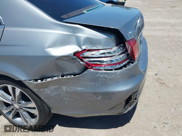 2014 Mercedes-Benz E 350 Sport with VIN WDDHF5KB7EA799411, listed as a IAAI auction lot 42287331 with 192,595 mi miles and . Bid and sale history available at DreamBid. Image 6.