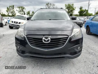 2015 Mazda CX-9 Grand Touring z VIN JM3TB2DA8F0457807, wystawiony jako Copart lot #61803555 z przebiegiem 110 104 mil mil oraz Czysty tytuł • Clean title. Historia ofert i sprzedaży dostępna na DreamBid. Obrazek 5.