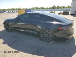 2018 Tesla Model S 75D с VIN 5YJSA1E27JF271596, выставлен на аукционе Copart как лот 57681565 с пробегом 106 710 миль миль и Списание • Salvage title. История ставок и продаж доступна на DreamBid. Изображение 2.