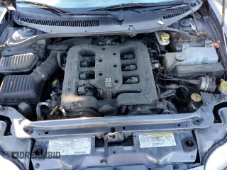 2003 Chrysler Concorde z VIN 2C3AD36M73H520219, wystawiony jako Copart lot #82895394 z przebiegiem 242 758 mil mil oraz Szkoda całkowita • Salvage title. Historia ofert i sprzedaży dostępna na DreamBid. Obrazek 13.