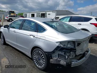2017 Ford Fusion Titanium with VIN 3FA6P0K90HR266556, listed as a IAAI auction lot 41947924 with 135,628 mi miles. Bid and sale history available at carsss.com. Image 3.