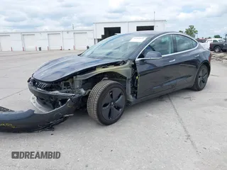 2018 Tesla Model 3 Long Range Battery with VIN 5YJ3E1EB3JF119498, listed as a IAAI auction lot 41966643 with 45,566 mi miles and . Bid and sale history available at DreamBid. Image 2.