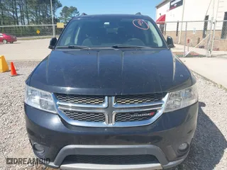 2015 Dodge Journey SXT with VIN 3C4PDCBG2FT560953, listed as a IAAI auction lot 42053264 with 127,463 mi miles. Bid and sale history available at carsss.com. Image 6.