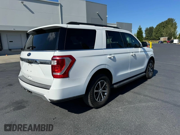 2019 Ford Expedition XLT with VIN 1FMJU1HT0KEA72881, listed as a Copart auction lot 62728155 with 79,109 mi miles and Salvage title. Bid and sale history available at DreamBid. Image 4.