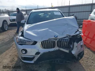 2019 BMW X1 sDrive28i with VIN WBXHU7C52K3H44360, listed as a IAAI auction lot 41709431 with 56,432 mi miles. Bid and sale history available at carsss.com. Image 13.