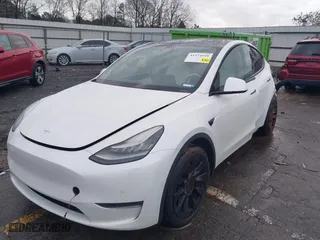 2020 Tesla Model Y Long Range with VIN 5YJYGDEEXLF020059, listed as a IAAI auction lot 41374959 with NaN miles. Bid and sale history available at carsss.com. Image 17.