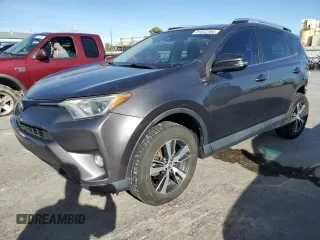 2016 Toyota RAV4 XLE with VIN 2T3RFREVXGW501613, listed as a Copart auction lot 81572164 with 127,730 mi miles and Salvage title. Bid and sale history available at DreamBid. Image 1.