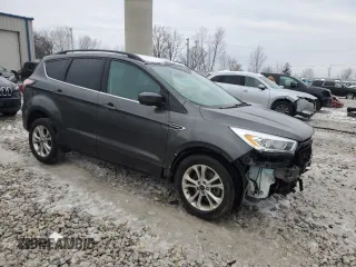 2017 Ford Escape SE with VIN 1FMCU9GD2HUB01278, listed as a Copart auction lot 83115634 with 112,753 mi miles and Clean Title. Bid and sale history available at carsss.com. Image 4.