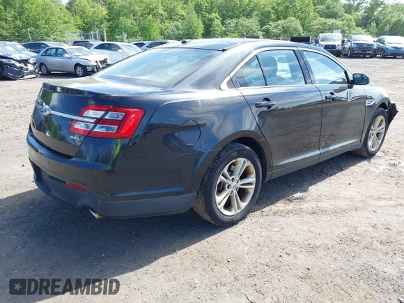 2015 Ford Taurus SEL with VIN 1FAHP2E88FG181055, listed as a IAAI auction lot 42307640 with 104,702 mi miles and . Bid and sale history available at DreamBid. Image 4.