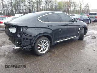 2015 BMW X6 xDrive35i with VIN 5UXKU2C53F0N76799, listed as a IAAI auction lot 41946628 with 173,607 mi miles. Bid and sale history available at carsss.com. Image 4.