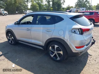 2018 Hyundai Tucson Value with VIN KM8J3CA26JU697712, listed as a IAAI auction lot 40323457 with 53,175 mi miles. Bid and sale history available at carsss.com. Image 3.